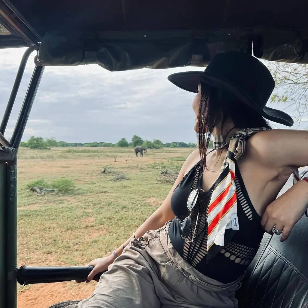 Expert tracker guiding guests through Yala's scrub jungle